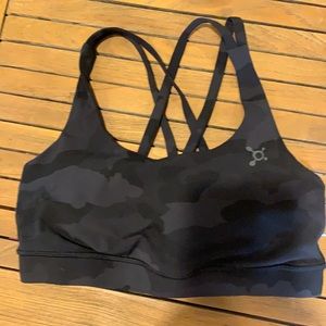 Worn once size 6 Lululemon energy sports bra with Orangetheory splat on front.